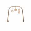 levo baby activity arch in walnut + wooden toys