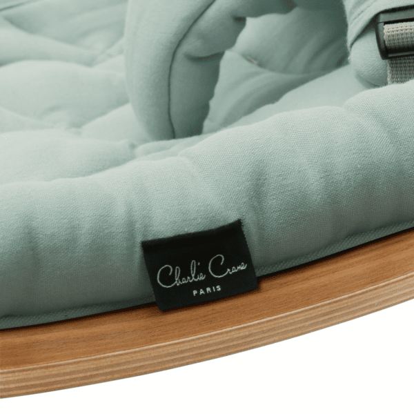 levo baby rocker in walnut with farrow cushion