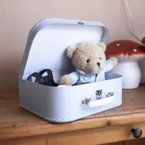 morris with clothes in a case