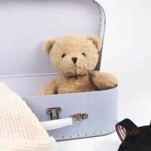 morris with clothes in a case